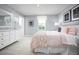 A beautifully decorated bedroom featuring a large bed, dresser, and charming accents at 700 Port Charlotte Ct, Sanford, NC 27330