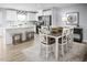 Bright kitchen and dining area featuring modern finishes, a spacious layout, and an eat-in kitchen at 700 Port Charlotte Ct, Sanford, NC 27330