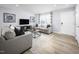 Inviting living room featuring modern decor, a comfortable sofa, and a bright, open space at 700 Port Charlotte Ct, Sanford, NC 27330