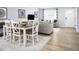 Comfortable dining area and living room combo featuring an open floor plan and stylish decor at 700 Port Charlotte Ct, Sanford, NC 27330