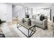 Inviting living room featuring stylish decor and an open layout connected to the dining area and kitchen at 700 Port Charlotte Ct, Sanford, NC 27330
