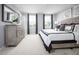 Serene bedroom with natural light, neutral decor, and comfortable furnishings at 700 Port Charlotte Ct, Sanford, NC 27330