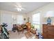 Cozy bedroom offers natural light and ample space for a home office at 726 Elizabeth Ave, Wake Forest, NC 27587