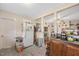 Kitchen featuring painted columns, white cabinets and appliances and laminate countertops at 726 Elizabeth Ave, Wake Forest, NC 27587