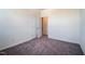 Cozy bedroom with plush gray carpeting and freshly painted walls at 743 Parc Townes Dr # 36, Wendell, NC 27591