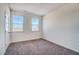 Bedroom with windows bringing natural light and a door for accessibility at 743 Parc Townes Dr # 36, Wendell, NC 27591