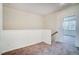 Hallway with soft carpet and a beautiful, inviting atmosphere at 743 Parc Townes Dr # 36, Wendell, NC 27591