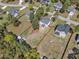 Lovely aerial shot showcases this neighborhood's home and available adjacent lot at 78 Parkview Ln, Lillington, NC 27546
