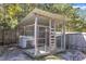 Backyard dog kennel and run area fenced for safety at 78 Parkview Ln, Lillington, NC 27546