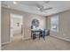 Bedroom with neutral walls, plush carpeting, and a ceiling fan at 78 Parkview Ln, Lillington, NC 27546