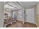 Inviting dining area with coffered ceiling, traditional table and chairs, and lots of natural light at 78 Parkview Ln, Lillington, NC 27546