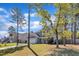 Pleasant two-story home with a two-car garage, landscaped front yard, and welcoming covered porch at 78 Parkview Ln, Lillington, NC 27546