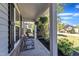 Inviting front porch with comfortable seating and stylish decor, perfect for enjoying the outdoors at 78 Parkview Ln, Lillington, NC 27546