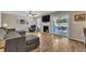 Inviting living room features a cozy fireplace and sliding glass doors to the outdoor patio at 78 Parkview Ln, Lillington, NC 27546