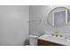 Clean bathroom with marble countertop, modern fixtures, and elegant mirror at 80 Greta Ln, Henderson, NC 27537