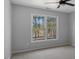 Bright bedroom with neutral walls, large windows, and view at 80 Greta Ln, Henderson, NC 27537
