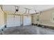 Spacious two car garage with ample room for parking and storage at 80 Greta Ln, Henderson, NC 27537