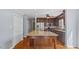 Well-equipped kitchen with stainless steel appliances, granite countertops, and a large island at 80 Greta Ln, Henderson, NC 27537