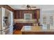 Open kitchen featuring stainless steel appliances, and an island with granite countertops at 80 Greta Ln, Henderson, NC 27537