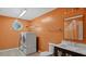 Practical laundry room with modern washer and dryer, storage, and a sink at 80 Greta Ln, Henderson, NC 27537