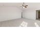 Vaulted ceiling bedroom featuring carpeted floors, ceiling fan and bright natural light at 816 Canis Minor Rd, Wendell, NC 27591