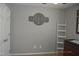 Neutral Bedroom featuring a 'Huntley Grey' nameplate, ladder, and dark wood changing table at 860 Bear Rd, Benson, NC 27504