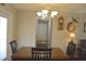 Dining room with a chandelier, dark table and chairs, and mounted wildlife decor at 860 Bear Rd, Benson, NC 27504