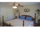 Spacious bedroom featuring a four-poster bed, ample closet space, and a relaxing ambiance at 860 Bear Rd, Benson, NC 27504