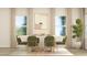 Bright dining area showcasing a modern table, comfortable chairs, and plenty of natural light at 879 Pilot St, Haw River, NC 27258