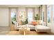 Cozy living room with stylish sofa, accent pillows, and bright natural lighting at 879 Pilot St, Haw River, NC 27258