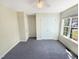 Bright bedroom with large closets and view to backyard at 10 Cricket Hollow Run, Clayton, NC 27520
