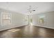 Bright, spacious bedroom featuring multiple windows and hardwood floors at 10119 Second Star Ct, Raleigh, NC 27613