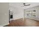 Bright bedroom with hardwood floors, ceiling fan and en-suite bathroom at 10119 Second Star Ct, Raleigh, NC 27613
