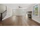 Bright living room with fireplace and ceiling fan at 10119 Second Star Ct, Raleigh, NC 27613