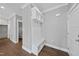 Mudroom with storage bench and hooks near entry at 10119 Second Star Ct, Raleigh, NC 27613