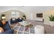 Cozy bonus room boasts stylish furnishings and comfortable seating with natural light at 1019 Thoughtful Spot Ln, Durham, NC 27703