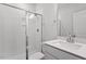 Modern bathroom with a glass-enclosed shower, white subway tile, and a vanity with quartz countertop at 104 Black Walnut Dr # 202, Garner, NC 27529