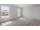 This bedroom has carpet and a lot of natural light at 104 Black Walnut Dr # 202, Garner, NC 27529