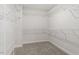 This walk-in closet has built-in shelving and ample storage space at 104 Black Walnut Dr # 202, Garner, NC 27529