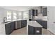 Modern kitchen features shaker cabinets, stainless steel appliances and quartz countertops at 104 Black Walnut Dr # 202, Garner, NC 27529