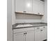 Functional laundry room with white cabinets, offering ample storage and workspace at 104 Black Walnut Dr # 202, Garner, NC 27529