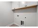 Utility room with hookups, providing a dedicated space for laundry appliances at 104 Black Walnut Dr # 202, Garner, NC 27529