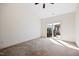 Bright and airy bedroom with sliding glass door to patio and carpeted floors at 1064 Blue Bird Ln, Wake Forest, NC 27587