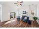 Spacious living room offers a fireplace, comfortable seating, and sliding doors providing seamless access to the backyard at 1064 Blue Bird Ln, Wake Forest, NC 27587
