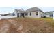 Expansive backyard featuring a screened-in porch, perfect for enjoying the outdoors in comfort and style at 124 Alta Crest Ln, Garner, NC 27529