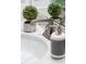 Modern bathroom sink with brushed nickel faucet and stylish soap dispenser on white countertop at 124 Alta Crest Ln, Garner, NC 27529