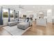 Open-concept living space with a seamless flow between the living room, dining area, and kitchen at 124 Alta Crest Ln, Garner, NC 27529