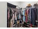 Spacious walk-in closet offers ample storage with rods and shelving for organization at 124 Alta Crest Ln, Garner, NC 27529