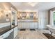 Bathroom showcasing a free standing tub, walk in shower and dual sink vanity at 1355 Bowling Road, Fuquay Varina, NC 27526