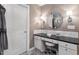 Cozy bathroom vanity area offering a well-lit makeup area and ample storage at 1355 Bowling Road, Fuquay Varina, NC 27526